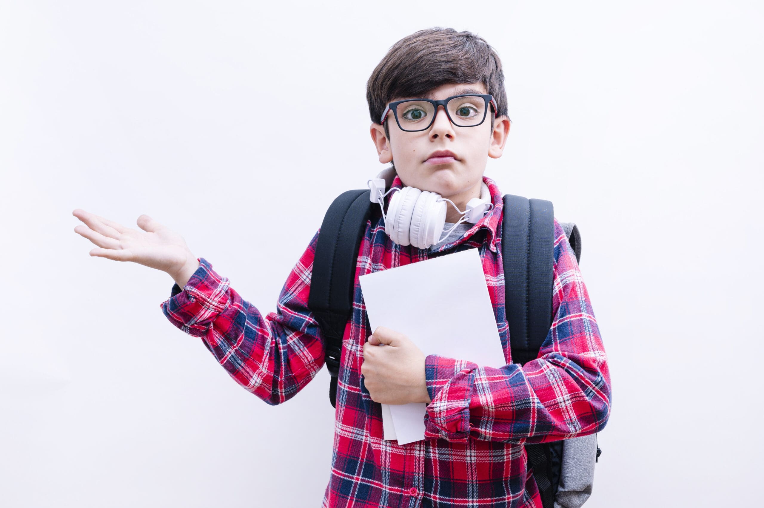 Beautiful student kid boy wearing backpack holding books over isolated white background